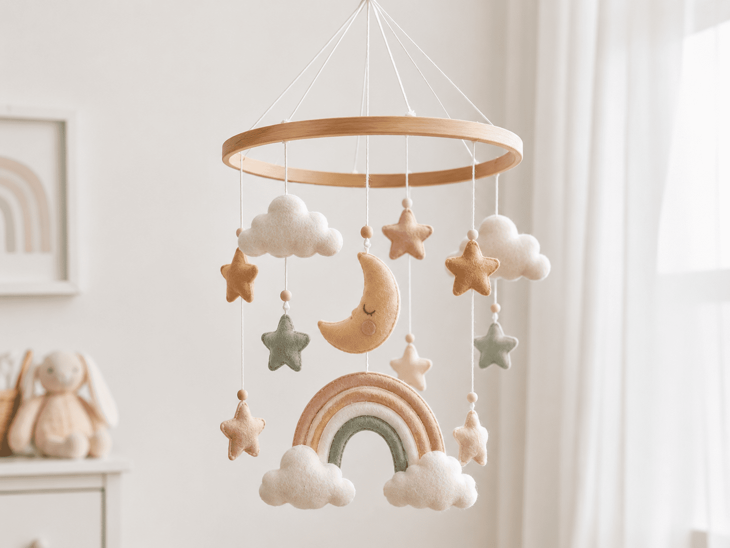 Nursery mobile with custom plush hanging toys for baby crib mobile projects